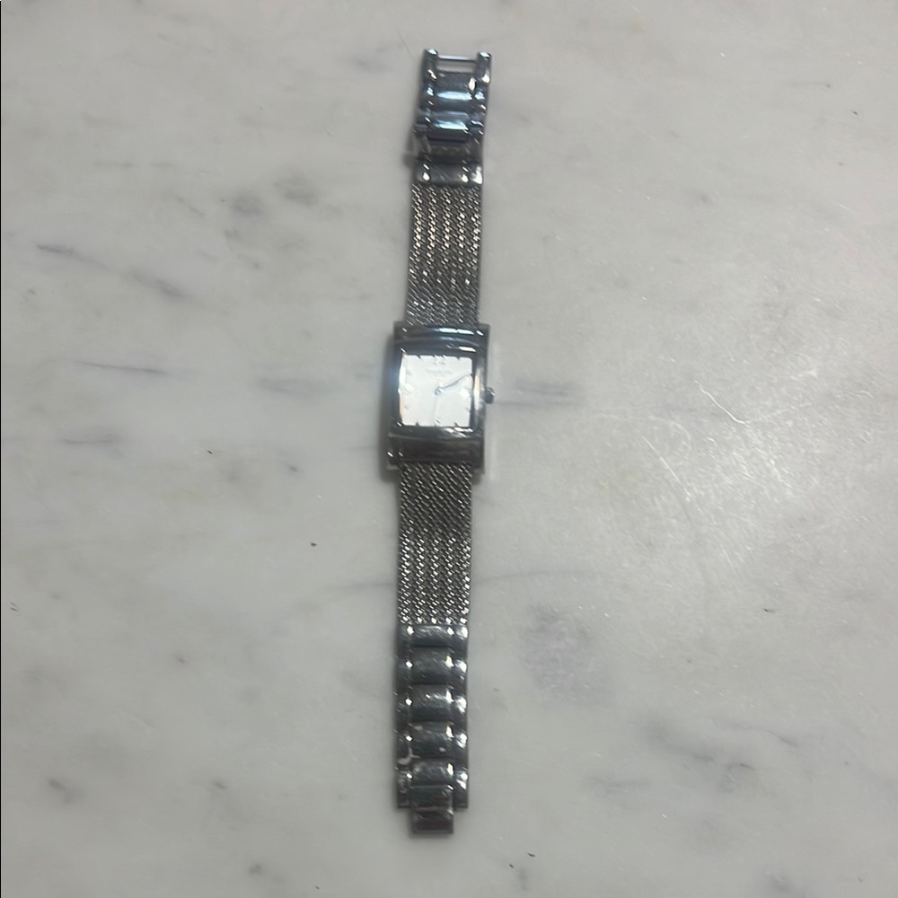 Kenneth Cole Silver Watch with Sleek Design